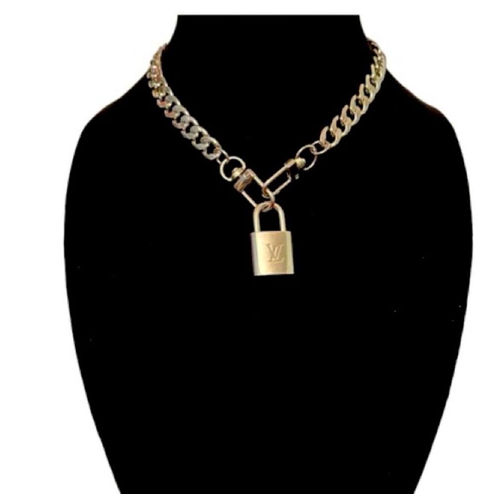 Authentic Louis Vuitton padlock ! No key included, but does come with gold chain